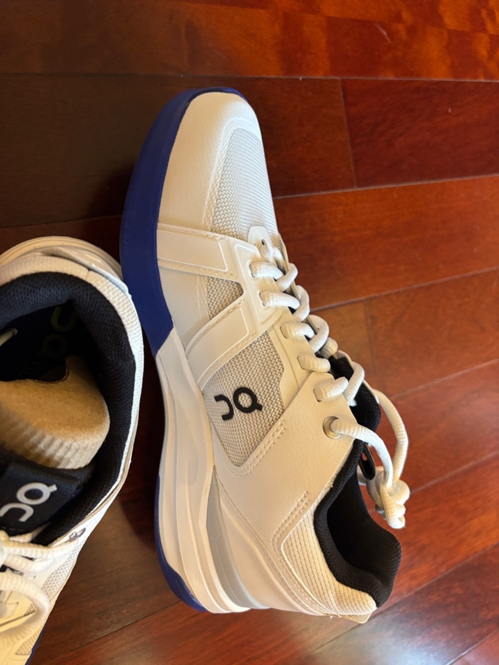 On Running women,s White Athletic Shoes with Blue Accents - Picture 3 of 5
